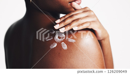 Sunscreen, shoulder and cream with woman in studio for sun protection, skincare and uv ray safety. Beauty, self care and dermatology with closeup of person on white background for spf benefits 126209049