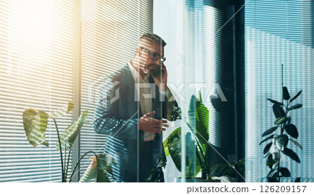 Phone call, serious and mature man with glasses, networking and discussion for investment opportunity. Business, entrepreneur and person with mobile for communication, morning and chat for funding 126209157