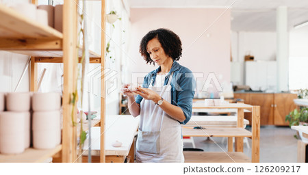 Woman, ceramics and shelf with inspection at workshop for shape, quality assurance and creativity with stock for clay product. Person, design and check for inventory, results and thinking at studio 126209217