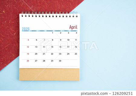April 2026 month desk calendar. 126209251