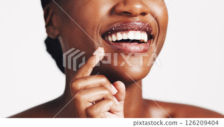 Beauty, lip scrub and smile with black woman in studio for exfoliation, spa glow and skincare. Cosmetics, sugar treatment and dermatology with closeup of person on white background for self care 126209404