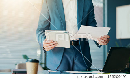 Hands, man and tablet with document in office for comparison, budget review and financial report. Male person, digital and paperwork of schedule update, accounting information and investment proposal Hands, man and tablet with document in office for comparison, budget review and financial report. Male person, digital and paperwork of schedule update, accounting information and investment proposal 126209491