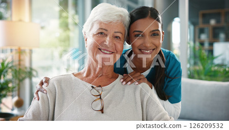 Happy woman, portrait and doctor with elderly patient for healthcare or volunteering service at home. Female people, medical worker or caregiver with smile, hug or senior client for assisted living Happy woman, portrait and doctor with elderly patient for healthcare or volunteering service at home. Female people, medical worker or caregiver with smile, hug or senior client for assisted living 126209532
