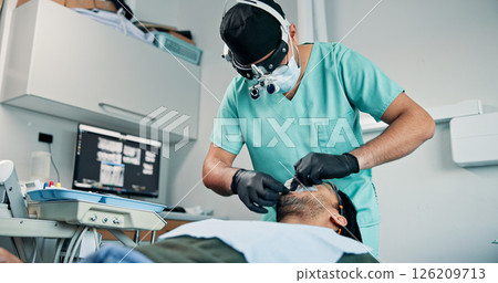Appointment, oral exam and patient with dentist in office for checkup or mouth operation. Healthcare, medical hygiene or procedure with dentistry professional and man at clinic for dental surgery 126209713