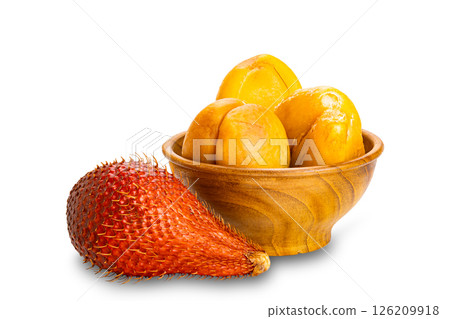 The whole Snake fruit or Salacca zalacc and the peeled in wooden bowl. 126209918
