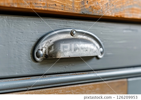 Rustic drawer with beautifully distressed design and unique textured handle. Front kitchen wooden frame cabinet door. Closeup Gray furniture base set. Trendy interior units. Home improvement. Samples. 126209953