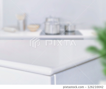 Wood table top on blurred kitchen background. can be used mock up for montage products display or design layout Wood table top on blurred kitchen background. can be used mock up for montage products display or design layout 126210042