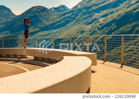 Tourist with camera in Norway nature 126210696