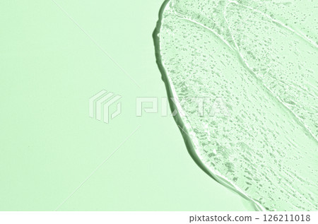 The texture of a moisturizing cosmetic gel or skin serum. Copy space 126211018