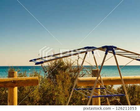 Camping on beach, empty clotheshorse Camping on beach, empty clotheshorse 126211053