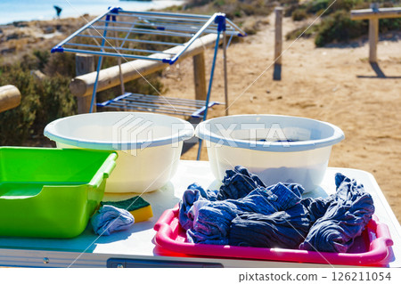 Washing clothing laundry outdoor Washing clothing laundry outdoor 126211054