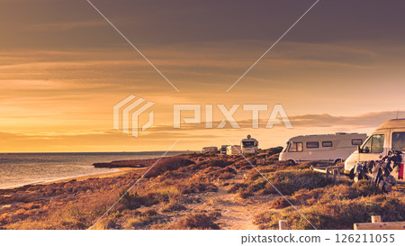 Camper cars on beach sea shore 126211055