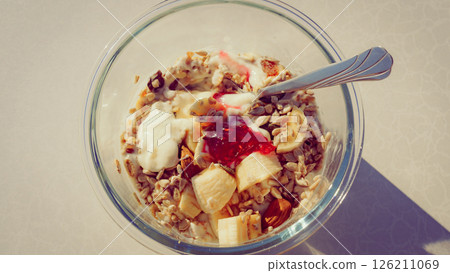 Healthy breakfast oatmeal with fruits Healthy breakfast oatmeal with fruits 126211069