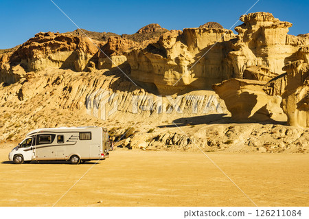 Camper car at rock formations Bolnuevo, Spain 126211084