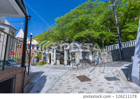 Kobe Kitano Tenmangu Shrine: Stone torii gates and stone steps surrounded by fresh greenery Kobe Kitano Tenmangu Shrine: Stone torii gates and stone steps surrounded by fresh greenery 126211178