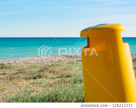 Empty beach with trash can 126211231