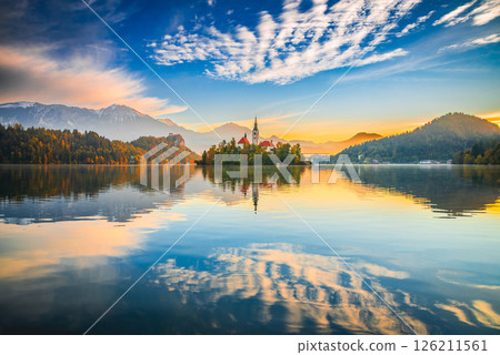 Bled, Slovenia. Scenic sunrise colors over Lake Bled, autumn season 126211561