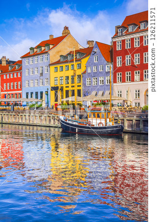 Copenhagen, Denmark. Vibrant harbor of Nyhavn, colorful buildings and boats. 126211571