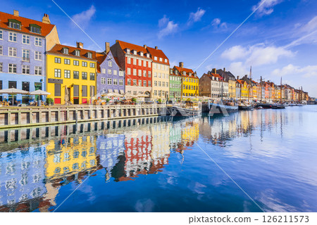 Copenhagen, Denmark. Vibrant harbor of Nyhavn, colorful buildings and boats. 126211573