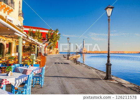 Chania, Crete - Greece. Beautiful Greek Islands, sunrise over Venetian Harbor. Chania, Crete - Greece. Beautiful Greek Islands, sunrise over Venetian Harbor. 126211578