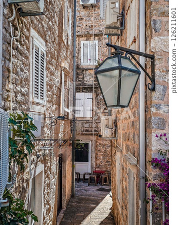 Old Town of Budva with Stone Streets, Historic Churches, and Yacht Marina 126211601