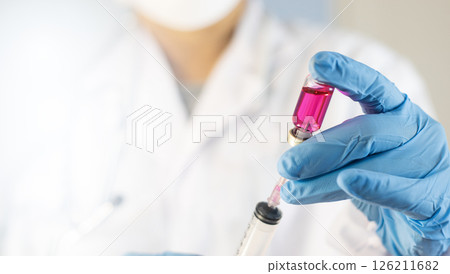 Doctor preparing vaccine, health insurance concept, health care, medicine, health and access to welfare, health concept 126211682