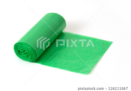 Green plastic garbage bag roll unrolled on white background, household waste bag for cleaning or trash disposal. 126211867