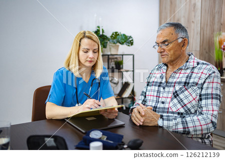 Health consultation between doctor and patient in clinic Health consultation between doctor and patient in clinic 126212139