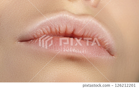 Perfect Natural Lip Makeup. Close Up Macro Photo with Perfect Clean Skin, Light Fresh Lip Make-up. Beautiful Spa Lips Perfect Natural Lip Makeup. Close Up Macro Photo with Perfect Clean Skin, Light Fresh Lip Make-up. Beautiful Spa Lips 126212201