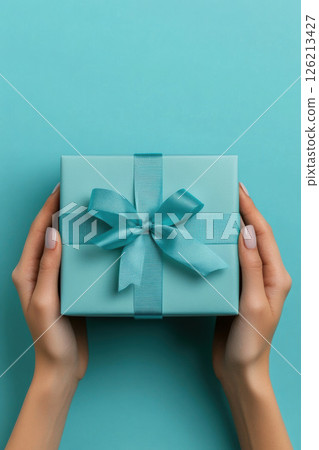 womans hands turquoise gift background image womans hands turquoise gift background image 126213427