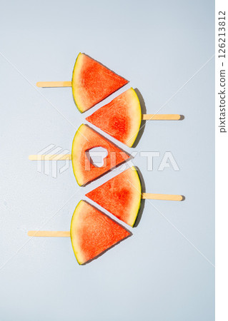 Watermelon slices isolated on blue background 126213812