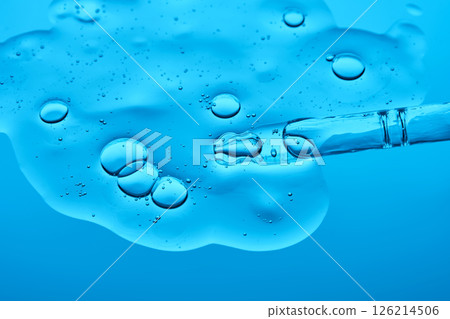 A pipette with a juicy gel texture. 126214506