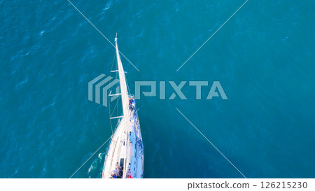 Sailing adventure on crystal blue waters beneath a bright sunlit sky Generative AI 126215230