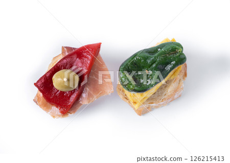 Traditional Spanish pintxos isolated on white background. 126215413