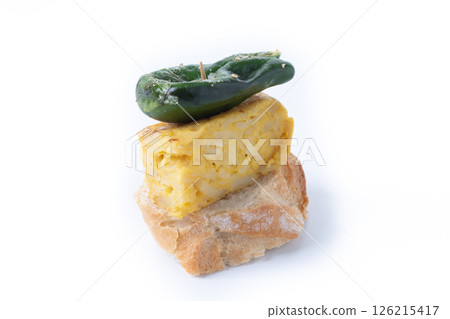 Spanish pincho with omelette and green pepper isolated on white background 126215417