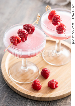 Elegant French Martini Cocktail on wooden table Elegant French Martini Cocktail on wooden table 126215425