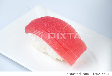 Tuna nigiri sushi on white ceramic dish Tuna nigiri sushi on white ceramic dish 126215427