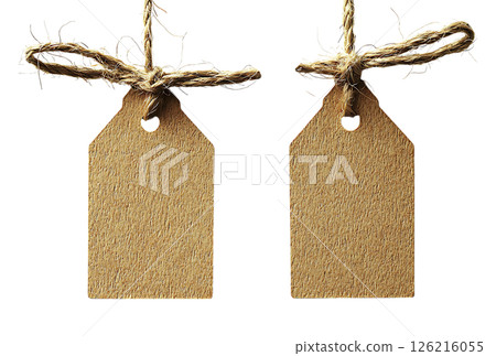 Two rustic kraft paper gift tags hang from a twine string, tied with a charming bow.  Perfect for adding a handmade, ecofriendly touch to your projects. 126216055