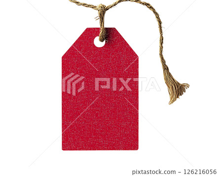 A vibrant red gift tag hangs elegantly from a rustic jute string, creating a visually appealing contrast. 126216056