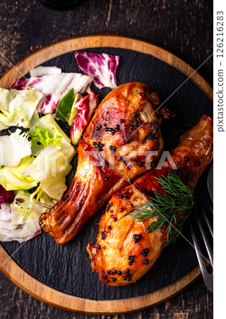 Roasted chicken drumsticks with vegetables Roasted chicken drumsticks with vegetables 126216283