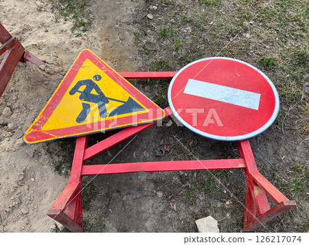 A road sign indicating stop digging is underway A road sign indicating stop digging is underway 126217074