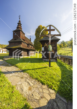 Wooden Church of Saint Michael the Archangel in Rusky Potok, Slovakia, featuring a wooden cross 126217149