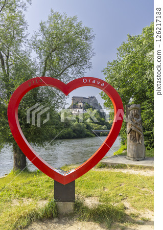 Orava Castle framed by a large red heart symbol on the banks of the Orava river 126217188