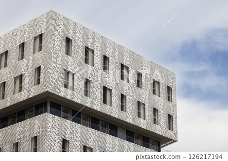 Modern building with decorative facade in Montpellier, France, showing innovative architecture Modern building with decorative facade in Montpellier, France, showing innovative architecture 126217194