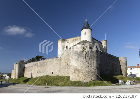 Noirmoutier Castle standing tall against a vibrant blue sky in France Noirmoutier Castle standing tall against a vibrant blue sky in France 126217197