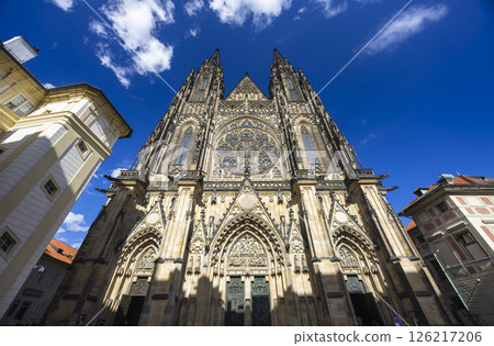 St. Vitus Cathedral standing tall in Prague Castle on sunny day St. Vitus Cathedral standing tall in Prague Castle on sunny day 126217206