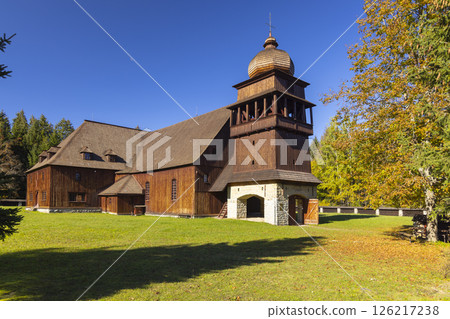 The Articulated Wooden Church of Svaty Kriz in Slovakia with Autumn Foliage 126217238