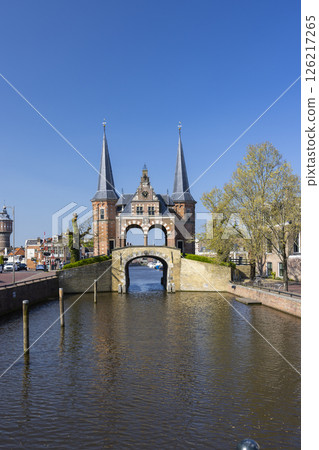 Waterpoort of Sneek reflecting on the canal in Friesland, Netherlands Waterpoort of Sneek reflecting on the canal in Friesland, Netherlands 126217265