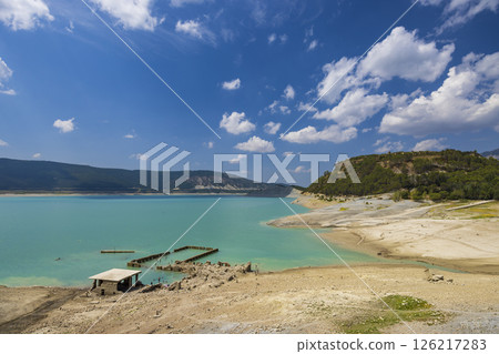 Yesa reservoir showing low water level during drought in Spain, Aragon, Sigues Yesa reservoir showing low water level during drought in Spain, Aragon, Sigues 126217283