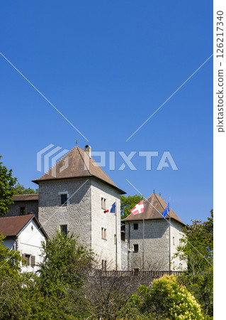 Chateau de Clermont showing french, Savoy and european flags in Auvergne Rhone Alpes, France Chateau de Clermont showing french, Savoy and european flags in Auvergne Rhone Alpes, France 126217340